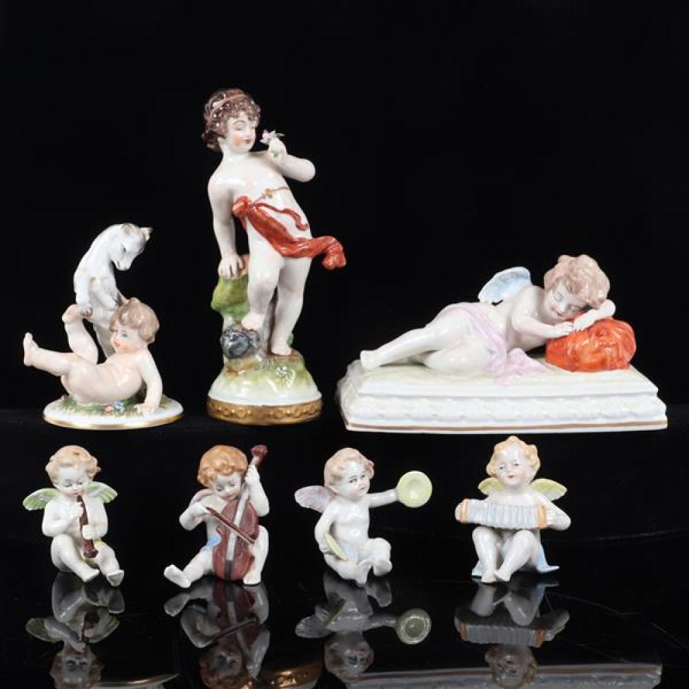 Appraisal: GERMAN PORCELAIN PUTTI AND CHERUB FIGURE GROUPING SCHEIBE-ALSBACH PC WINGED