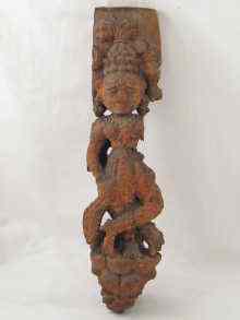 Appraisal: A carved Indian wooden figure of a female musician probably