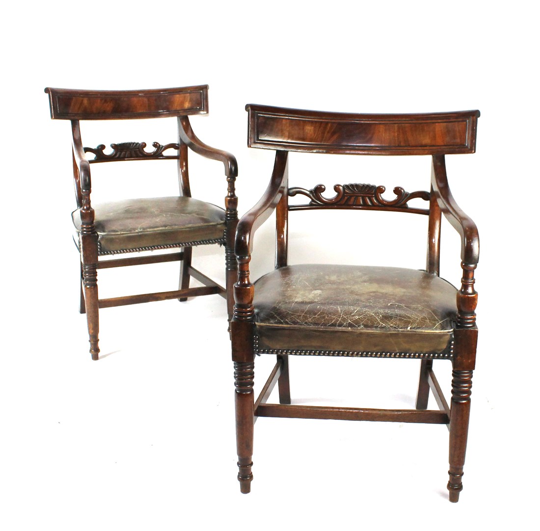 Appraisal: A pair of early th century mahogany carver chairs with