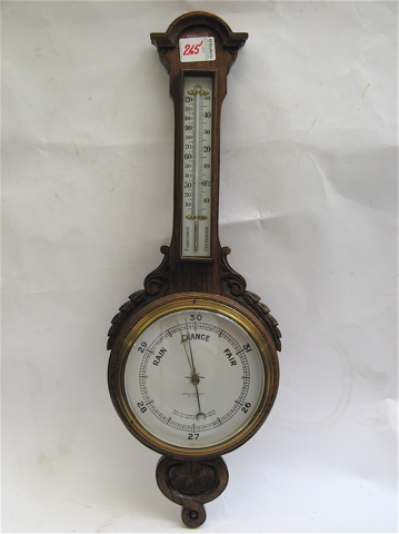 Appraisal: A VICTORIAN EDWARDIAN OAK WALL BAROMETER THERMOMETER hand carved banjo-shaped