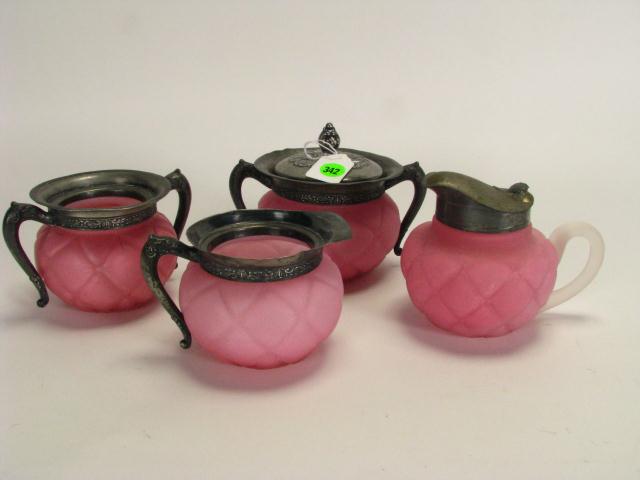 Appraisal: Four items of antique pink satin glass all with quilted