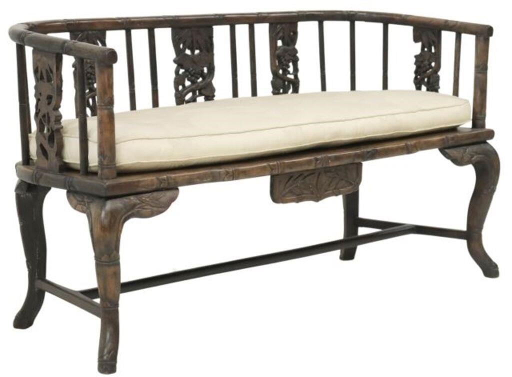 Appraisal: Chinese rosewood sofa th c having bent bamboo modeled rail