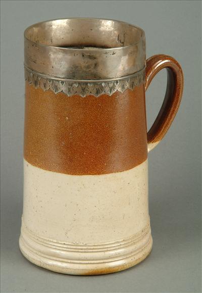 Appraisal: An English saltglazed stoneware silver-mounted mug probably London top half