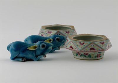 Appraisal: Two Chinese waterdroppers modelled as crouching rodents turquoise-glazed and a