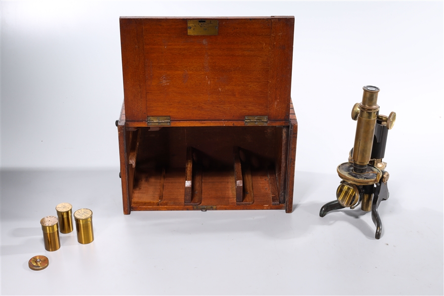 Appraisal: Antique brass microscope with various attachments and box H approx