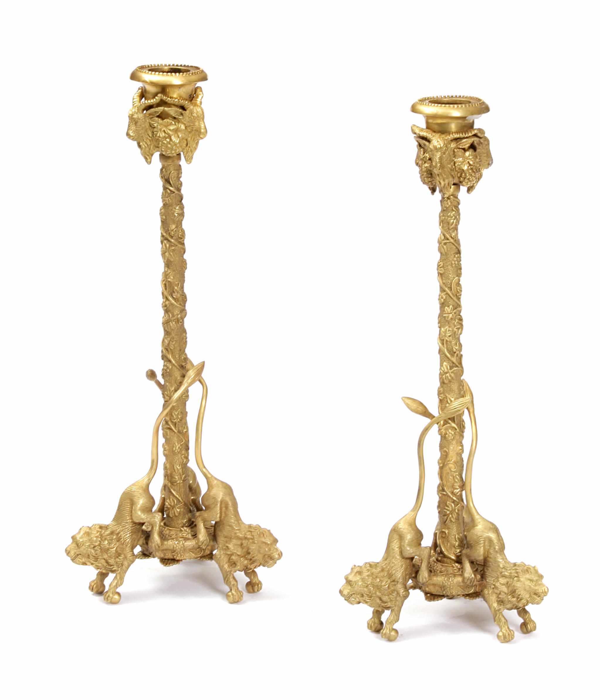 Appraisal: A pair of Renaissance style gilt bronze figural candlesticks height