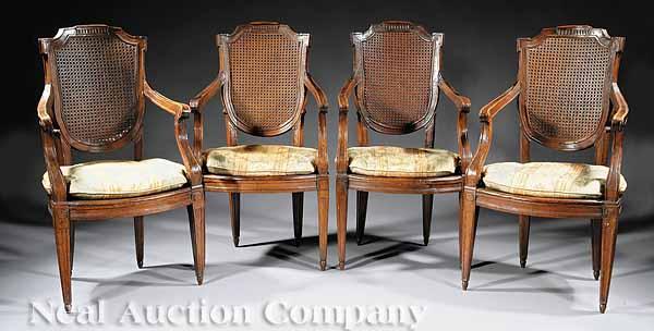 Appraisal: A Suite of Four Louis XVI Fruitwood Fauteuils th c