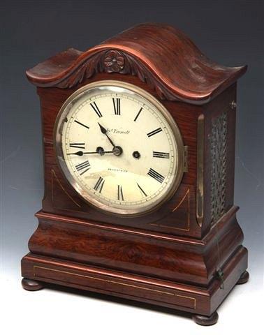 Appraisal: AN EARLY VICTORIAN ROSEWOOD TABLE CLOCK the white Roman dial