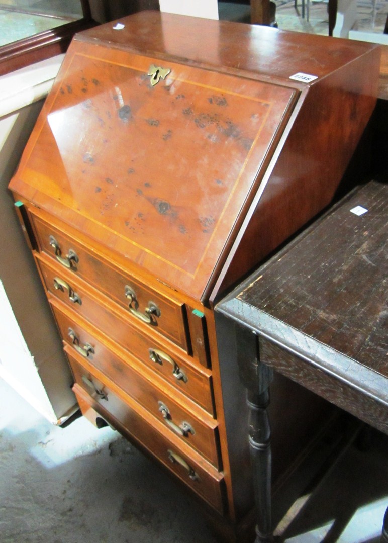 Appraisal: A small th century yew wood bureau