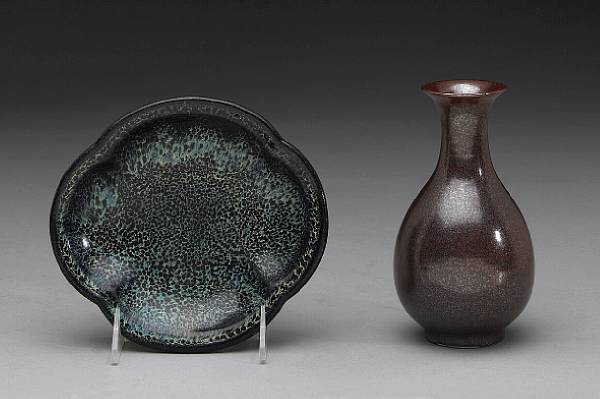 Appraisal: Two iron oxide glazed porcelains The first an th Century