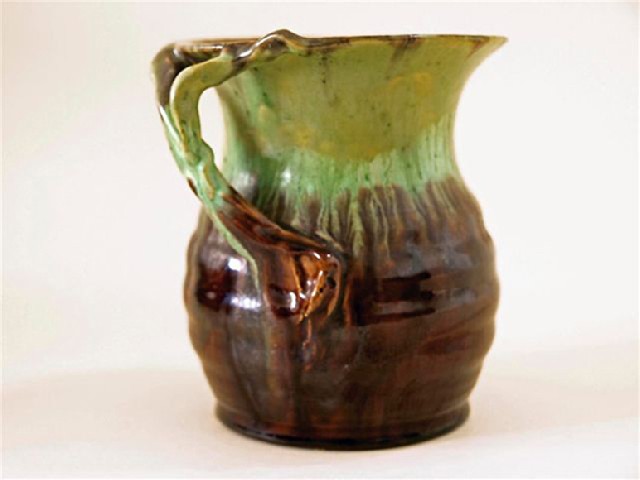 Appraisal: REMUED BRANCH HANDLED RIBBED VASE