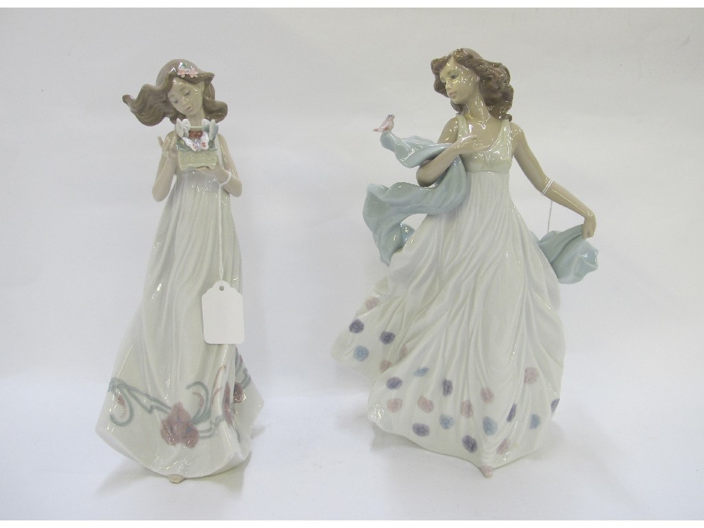 Appraisal: Two Lladro figures of ladies one with a box of