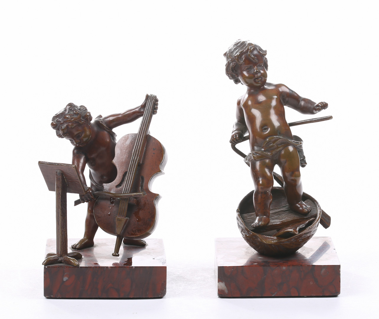 Appraisal: Pair of Continental bronze putti sculptures th century putti cello