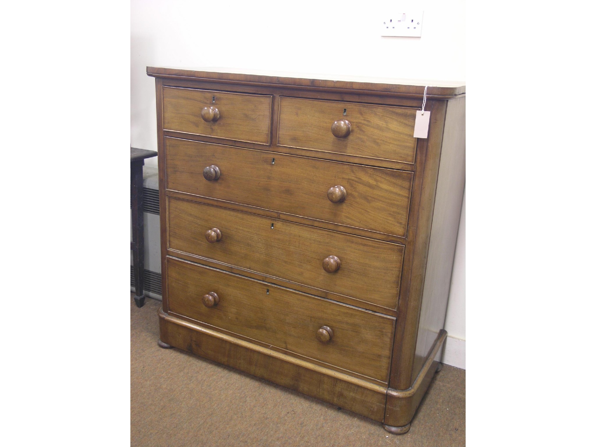 Appraisal: A Victorian mahogany chest two short and three long oak-lined