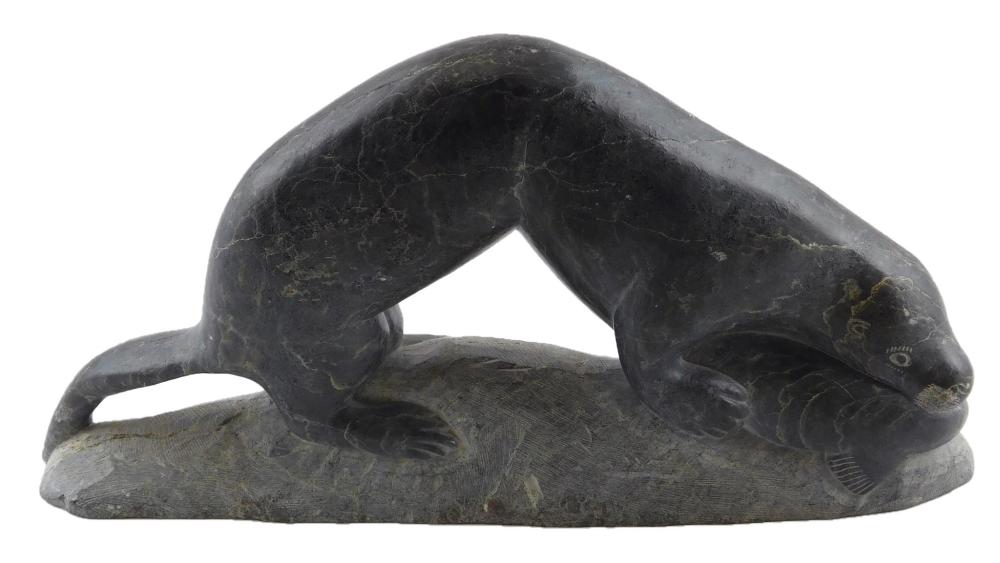 Appraisal: TRIBAL Inuit carved stone sculpture of otter eating fish attributed