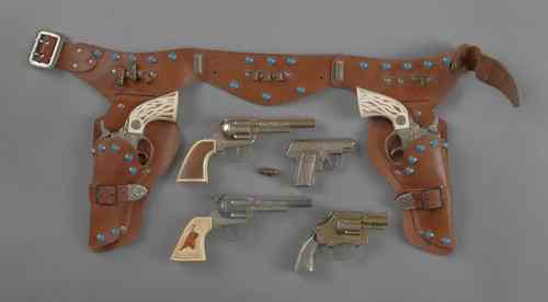 Appraisal: Six cap guns to include Texan Jr with a holster