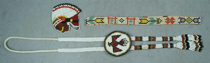 Appraisal: Beaded bolo tie with thunderbird design on slide overall with