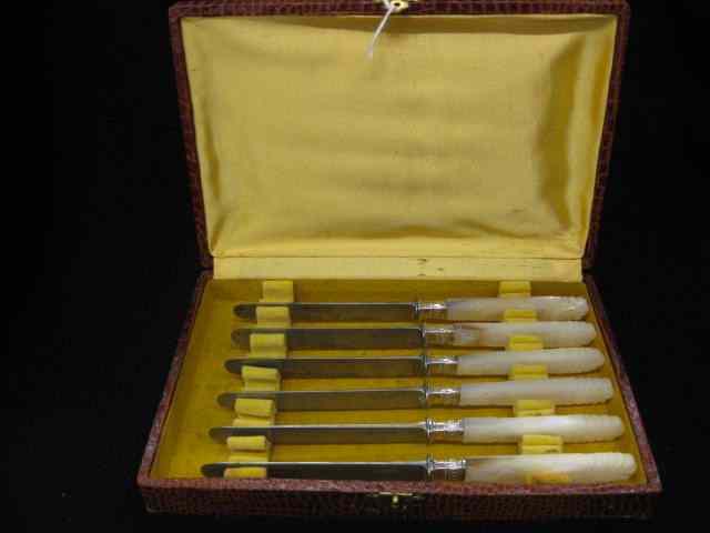 Appraisal: Carved Mother-of-Pearl Knives Victorian '' long sterling ferrules in box