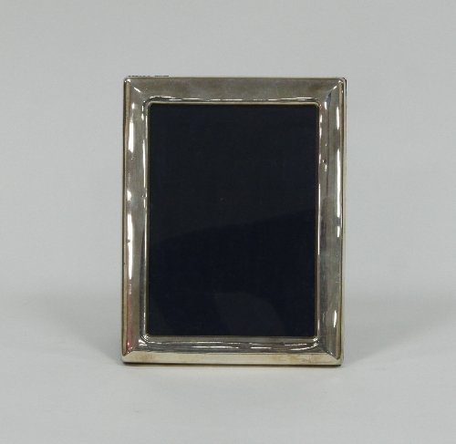 Appraisal: A rectangular silver photograph frame RC London cm x cm