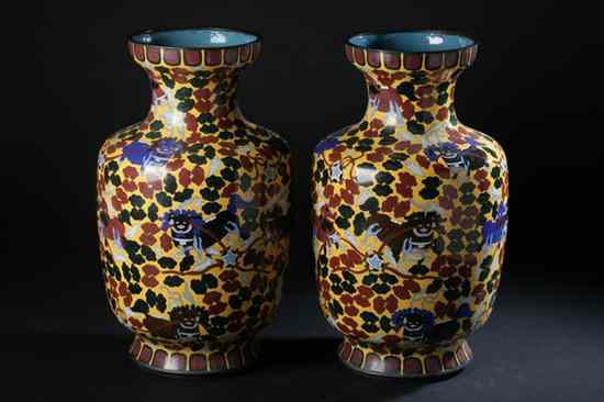 Appraisal: PAIR CHINESE CLOISONN ENAMEL VASES Fu lion decoration on yellow