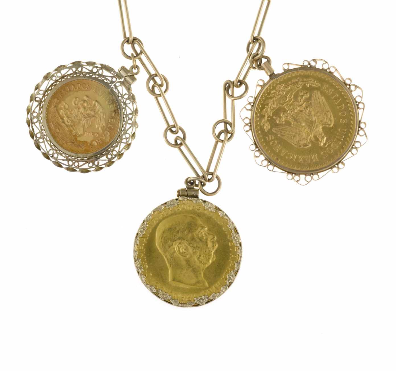 Appraisal: A nine karat gold necklace suspending seven gold coin and