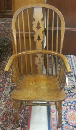 Appraisal: AN ELM AND YEW-WOOD WINDSOR ARMCHAIR English th century with