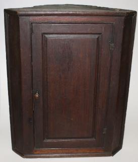 Appraisal: th c hanging oak corner cupboard raised panel door original