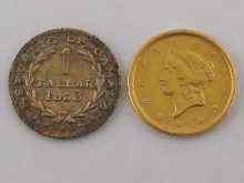 Appraisal: A USA gold one dollar coin dated together with another