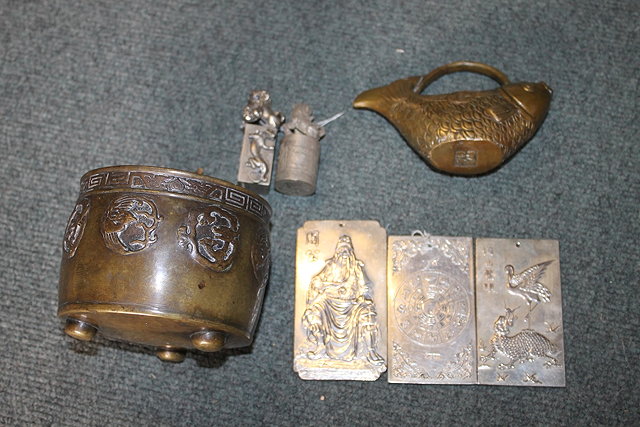 Appraisal: A CHINESE BRONZE CENSER three Chinese silver metal pendants with