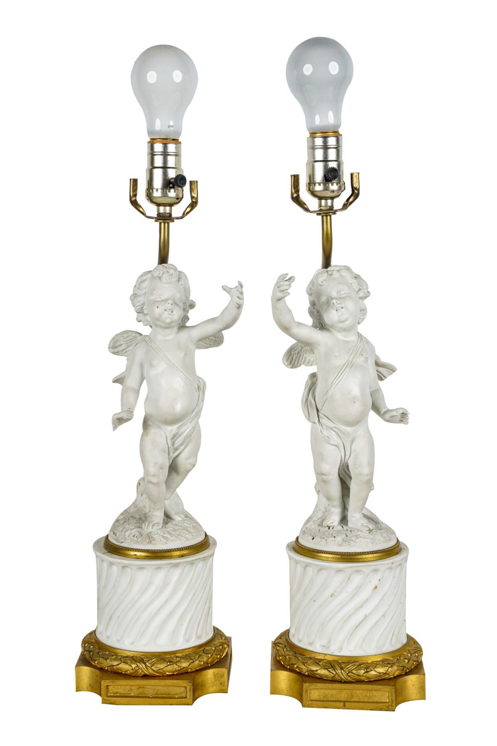 Appraisal: PAIR OF BISQUE PORCELAIN FIGURESeach signed 'Baigot' mounted to gilt