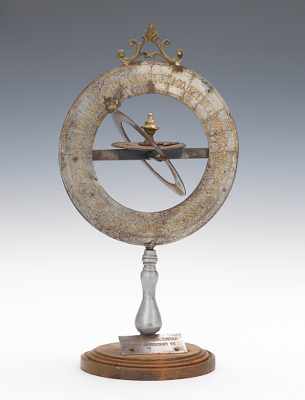 Appraisal: A Gilt Metal Perpetual Calendar on Wood Base A perpetual