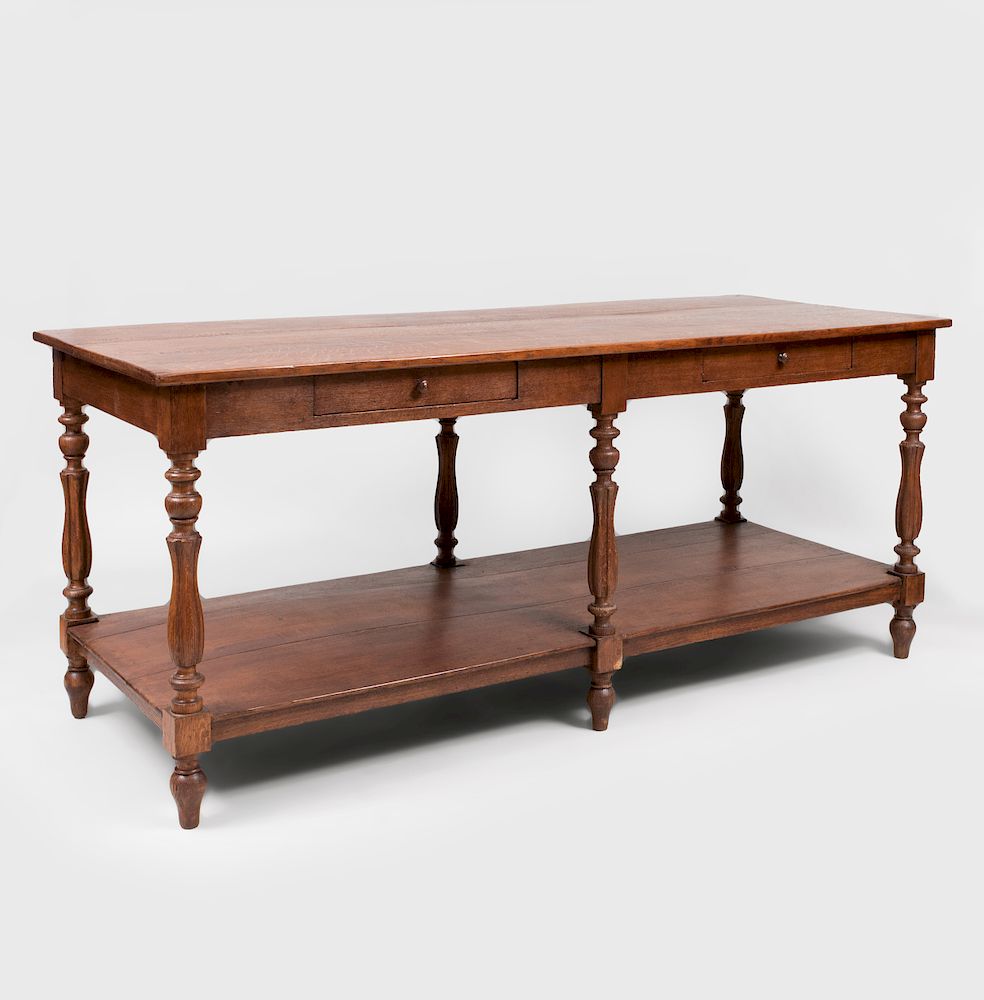 Appraisal: French Provincial Stained Oak Draper's Table Fitted with two frieze