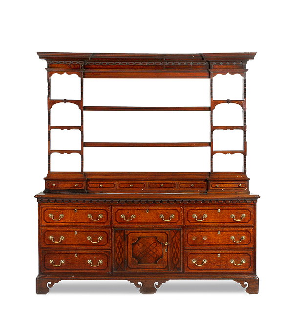 Appraisal: A GEORGE III NORTH COUNTRY OAK DRESSER the inverse breakfront