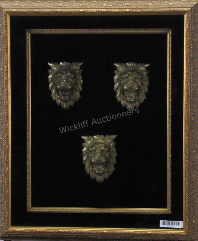 Appraisal: Framed English Lion Head Door Knockers three framed brass door