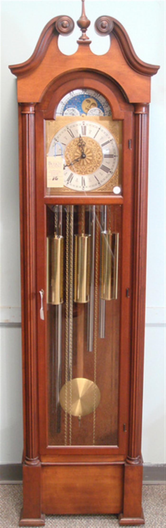 Appraisal: Cherry tube Colonial Clock Co chiming hall clock Westminster chimes