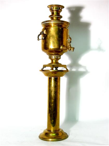 Appraisal: Russian brass samovar with numerous stamps Together with brass pedestal