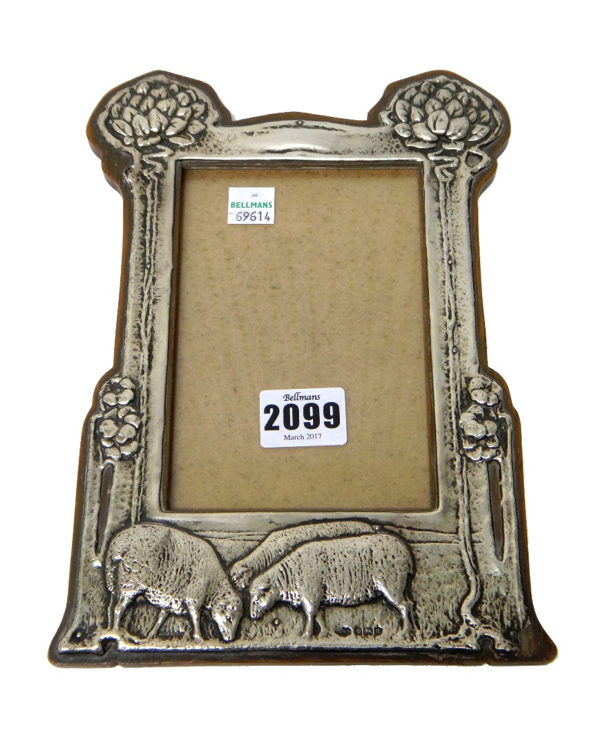 Appraisal: A silver mounted oak shaped rectangular Art Nouveau photograph frame