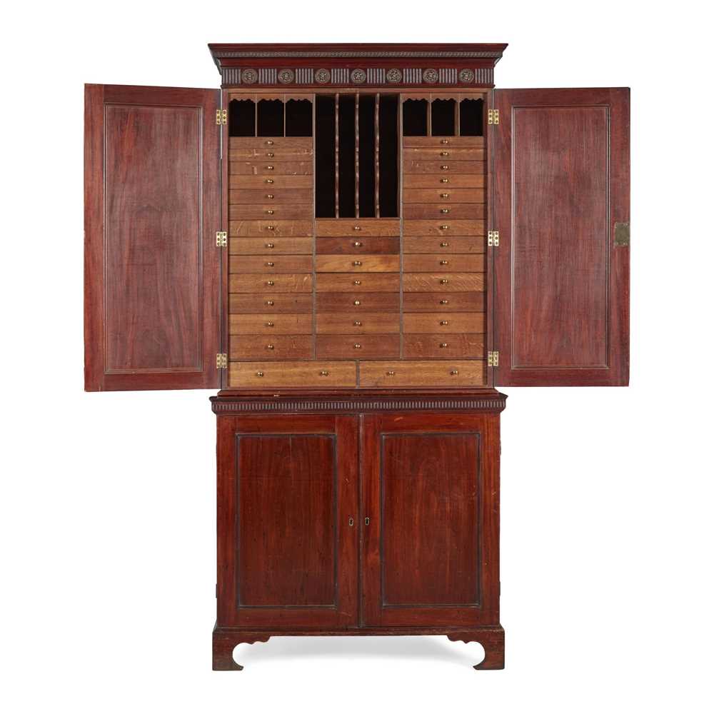 Appraisal: GEORGE III MAHOGANY ESTATE CABINET TH CENTURY the guilloche moulded