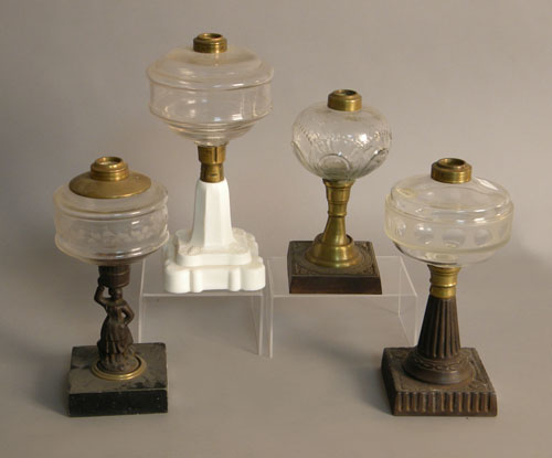 Appraisal: Four misc fluid lamps th th c