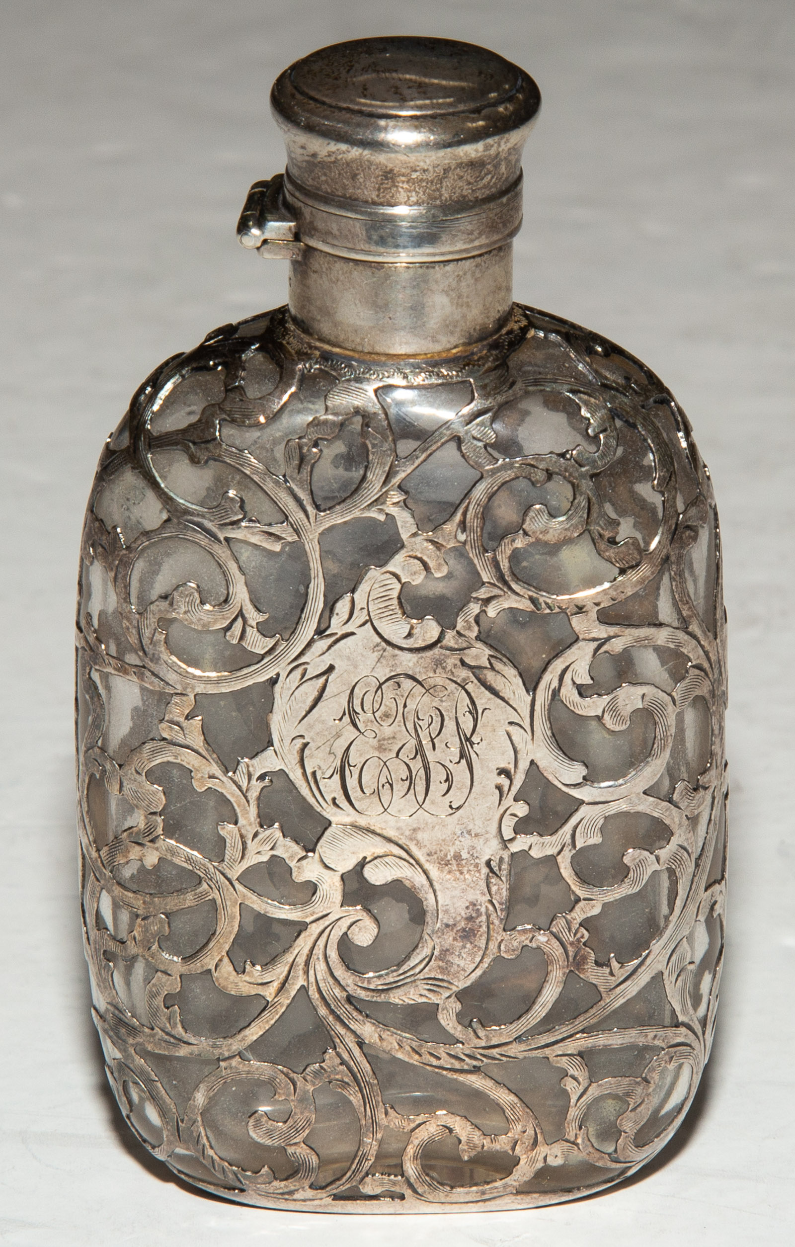 Appraisal: STERLING MOUNTED PERFUME FLASK Monogrammed in H