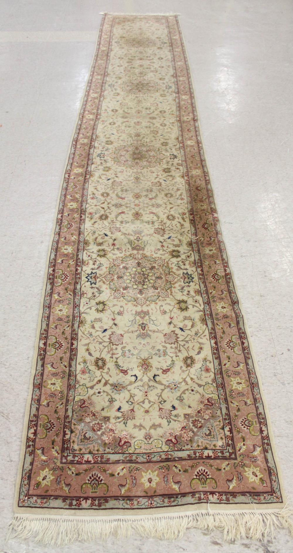 Appraisal: CONTEMPORARY PERSIAN WOOL AND SILK RUNNER floral and four floral