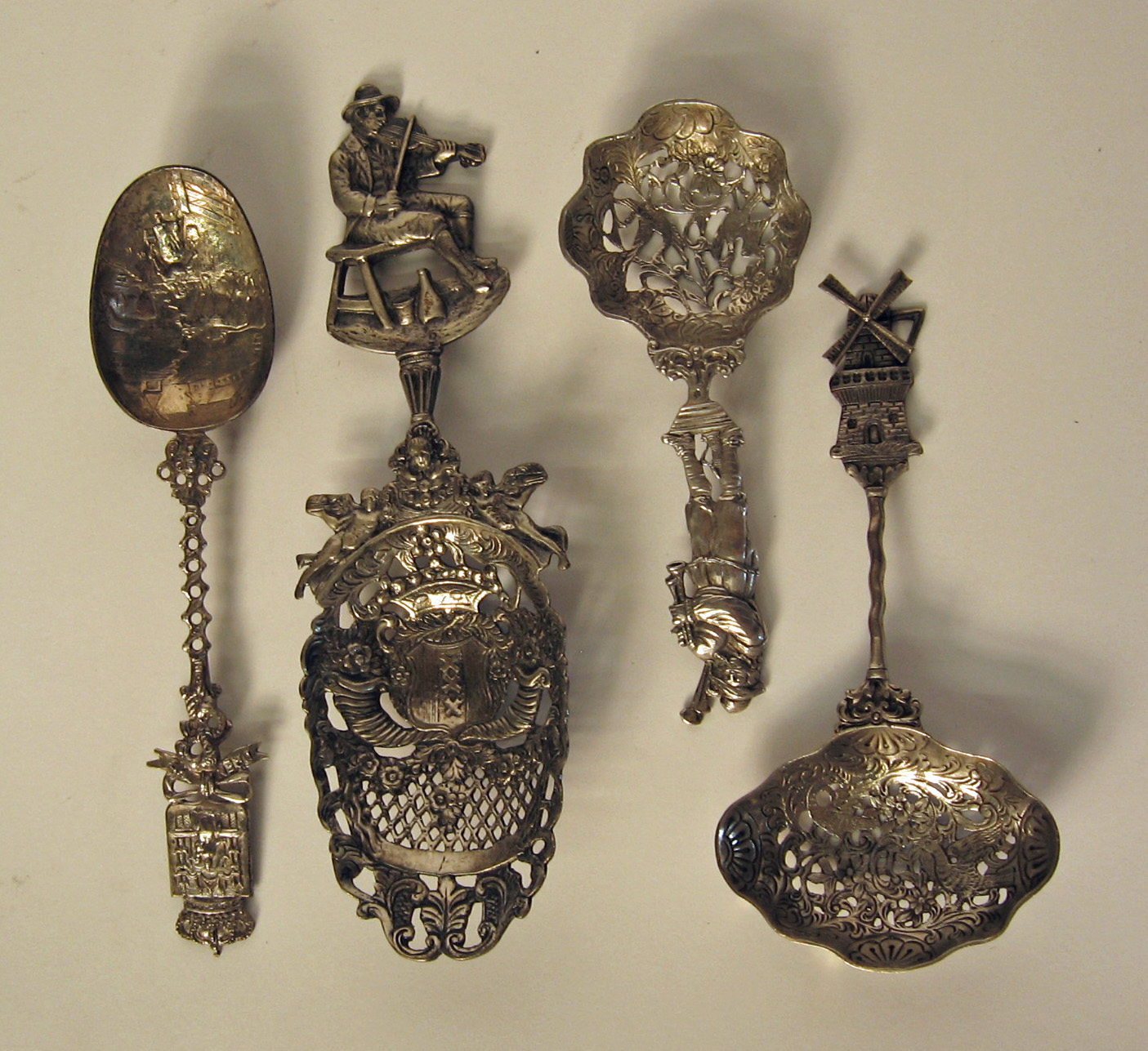 Appraisal: Four Continental silver novelty spoons th th century The first