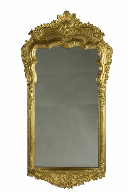 Appraisal: An th century continental carved giltwood and gesso mirror the