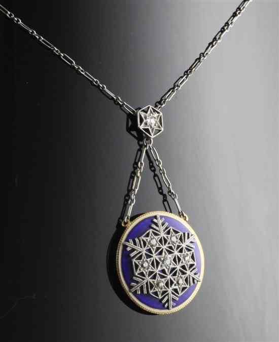 Appraisal: An Edwardian diamond set blue enamelled gold locket pendant decorated