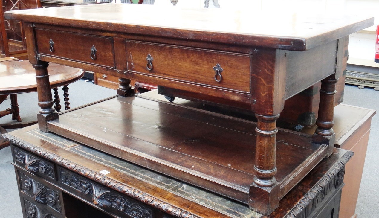 Appraisal: A th century oak coffee table the rectangular plank top