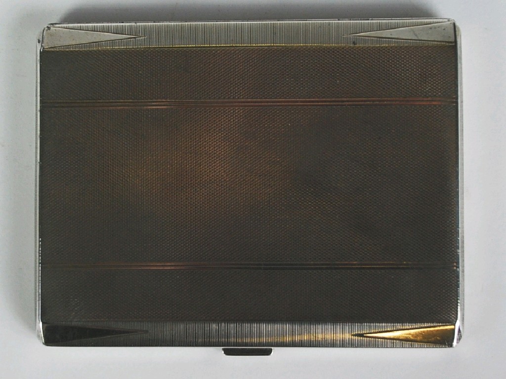 Appraisal: AN ART DECO SILVER POCKET CIGARETTE CASE oblong engraved and