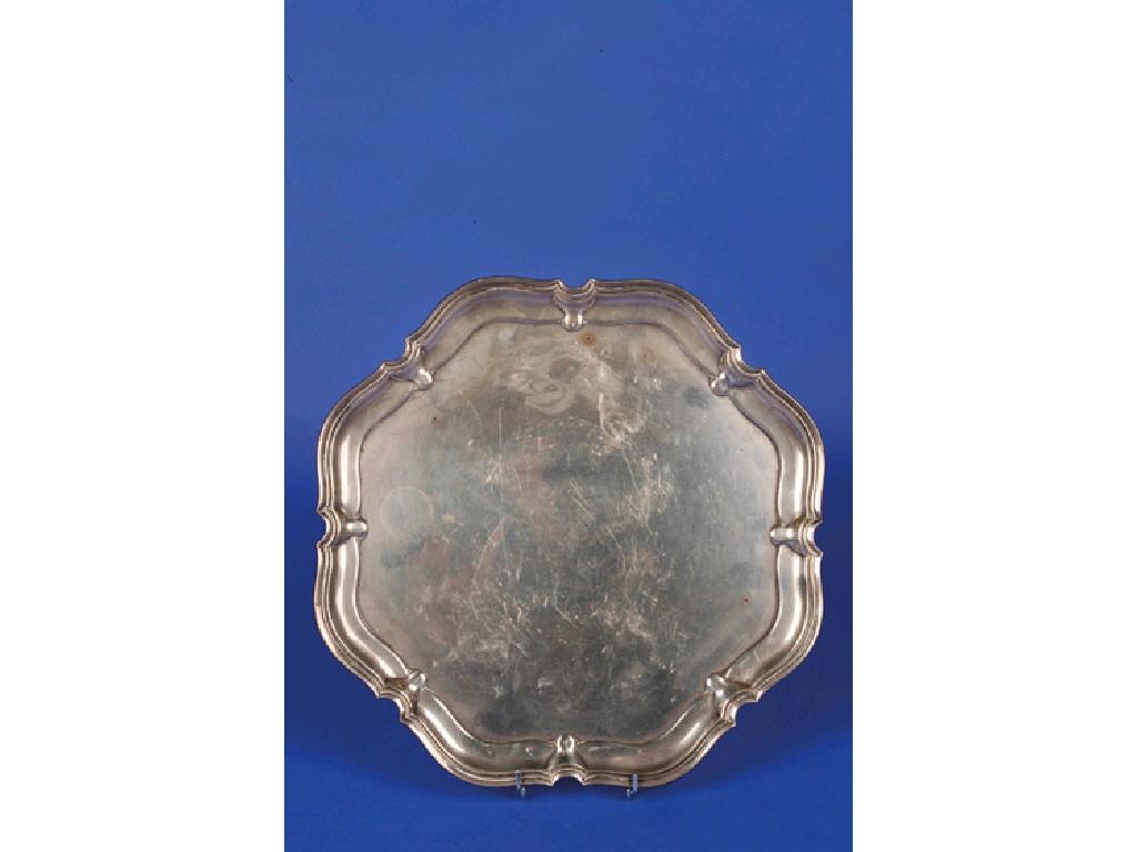 Appraisal: A SALVER of shaped circular form with a raised reeded