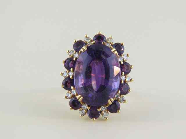 Appraisal: Amethyst Diamond Ring rich gems totaling carats with diamonds throughout