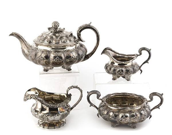 Appraisal: A George IV silver three piece tea set and extra