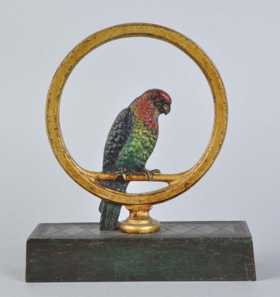 Appraisal: Cast Iron Parrot In Ring Doorstop Made by Bradley and